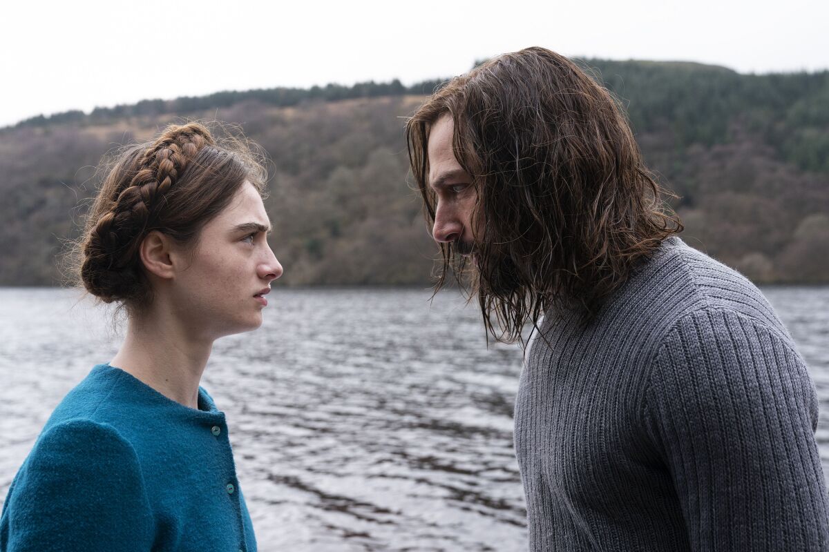 Raffey Cassidy and Michiel Huisman in the movie "The Other Lamb."
