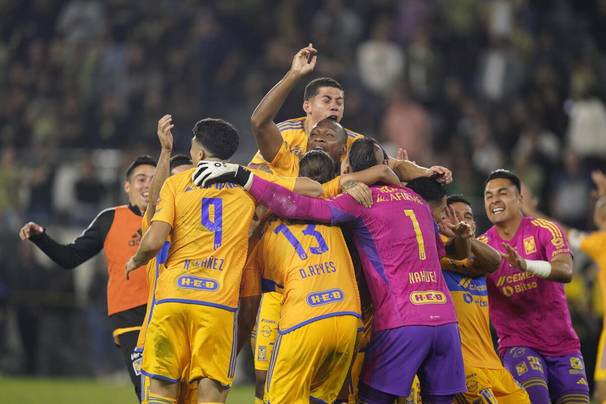 Tigres celebrate after winning a Campeones Cup soccer match against LAFC.