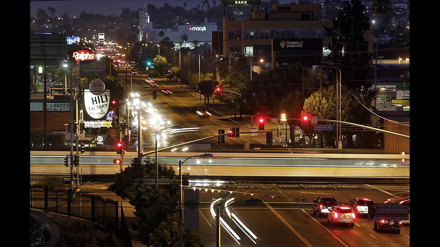 An Expo Line train crosses Crenshaw Boulevard at Exposition Boulevard in the Crenshaw District.