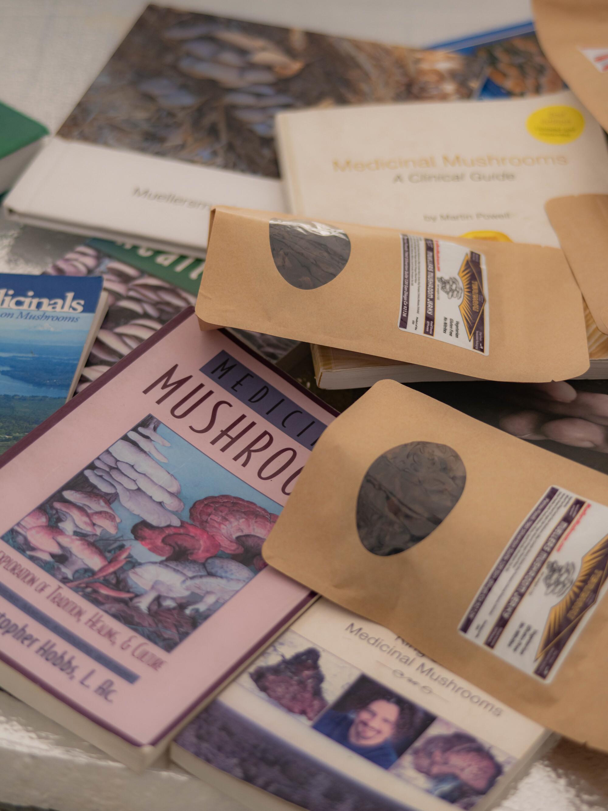 A pile of books and paper packages.