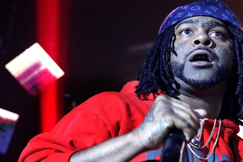 3051234-la-et-ms-03Greedo-hw -- The L.A. rapper 03 Greedo should be one of the year's breakout stars. But instead, he's staring down a potential decades-long prison sentence. Fans gathered to mourn (party) at one of his final performances, Friday, June 15, 2018, at the Globe Theater in Los Angeles before 03Greedo surrenders to serve his sentence. Credit: Hal Wells / Los Angeles Times