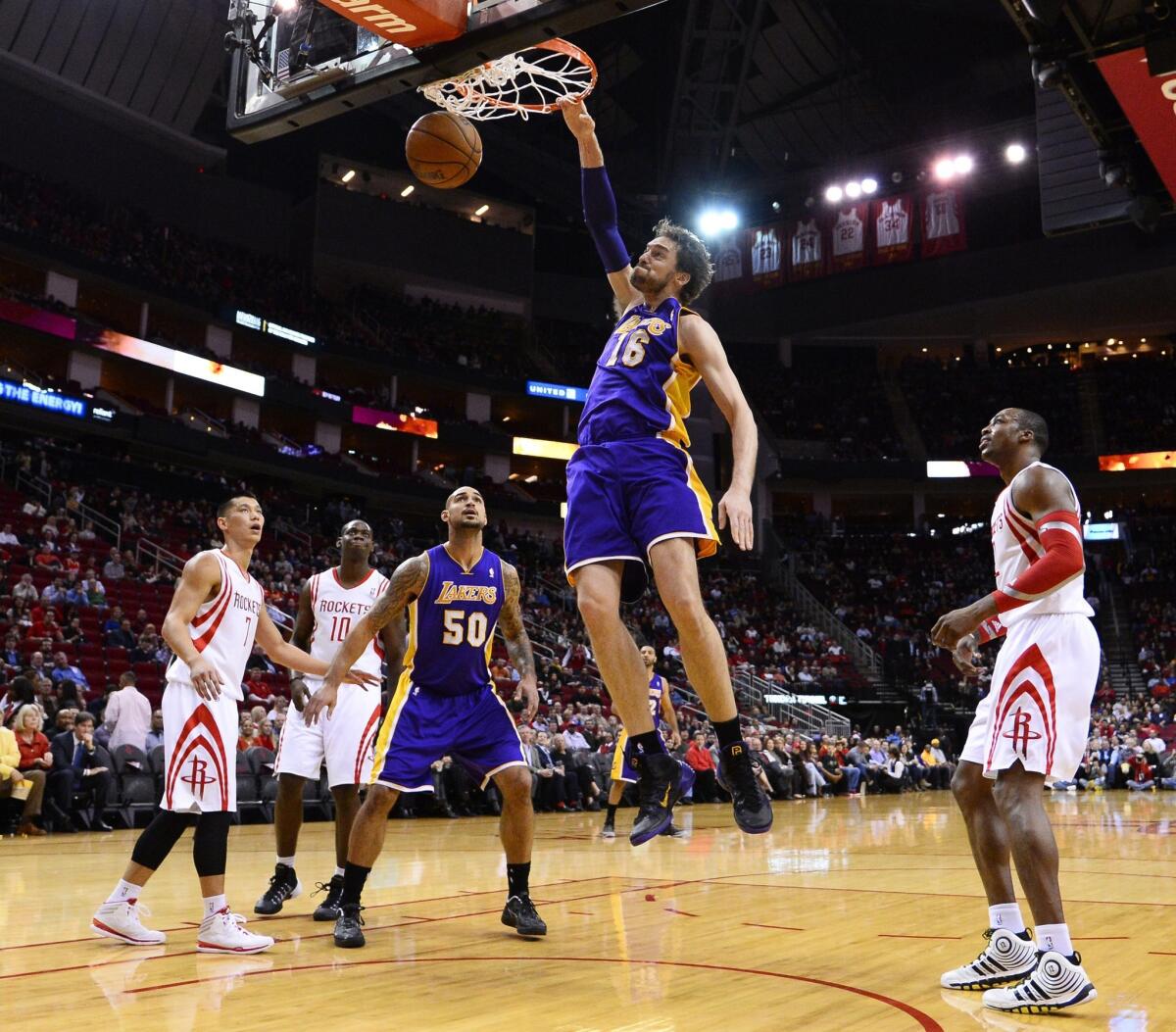 Lakers center Pau Gasol dunks during the first half of the team's 113-99 loss to the Houston Rockets on Wednesday.