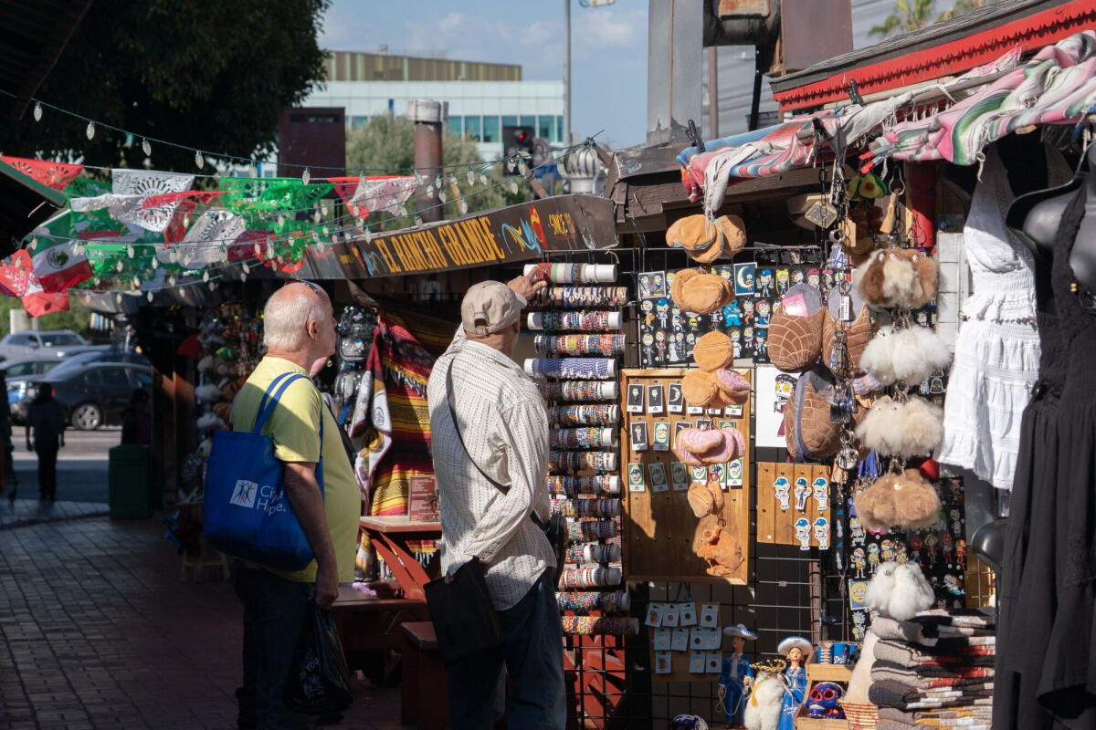 Shoppers on Olvera Street in Los Angeles.