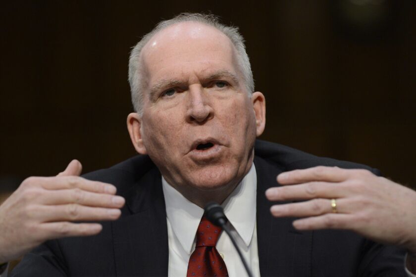 John Brennan responds to a senator's question during his confirmation hearings to be director of the CIA.