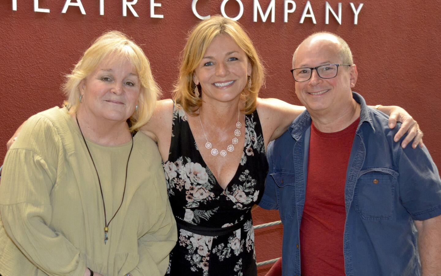 Family Service Agency's Laurie Bleick, left, is welcomed to the Colony Theatre for last week's presentation of "Manecdotes" by Suzanne Weerts and Steve Rosen.
