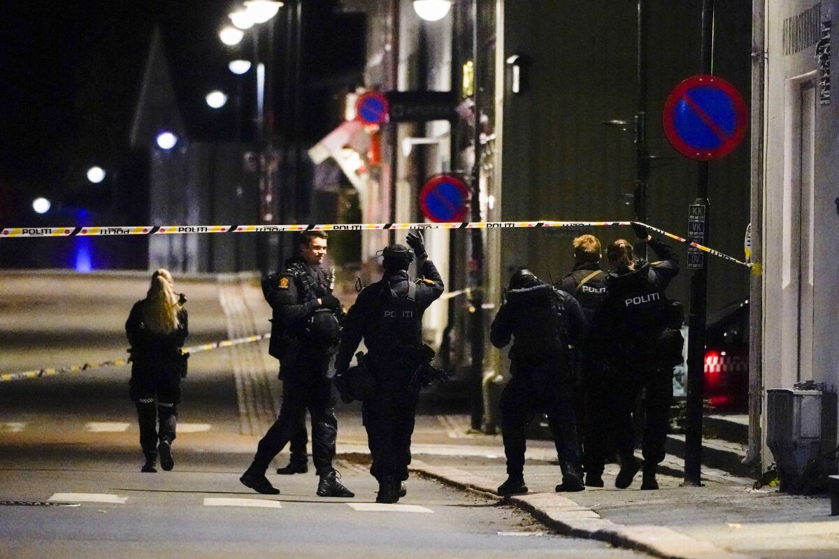 Police stand at the scene after an attack in Kongsberg, Norway, Wednesday, Oct. 13, 2021. Several people have been killed and others injured by a man armed with a bow and arrow in a town west of the Norwegian capital, Oslo. (Hakon Mosvold Larsen/NTB Scanpix via AP)