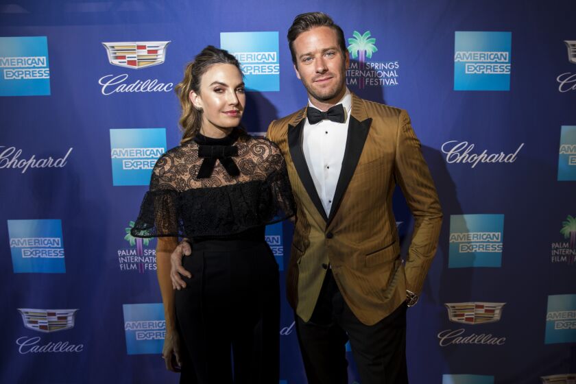PALM SPRINGS,CA --TUESDAY, JANUARY 02, 2018--Actor Armie Hammer on the red carpet with his, then wife, Elizabeth Chambers, on the red carpet of the 18th annual Palm Springs International Film Festival Gala, at the Palm Springs Convention Center, in Palm Springs, CA, Jan. 02, 2018. Hammer presented his "Call Me By Your Name," co-star Timothée Chalamet with the "Rising Star Award." (Jay L. Clendenin / Los Angeles Times)