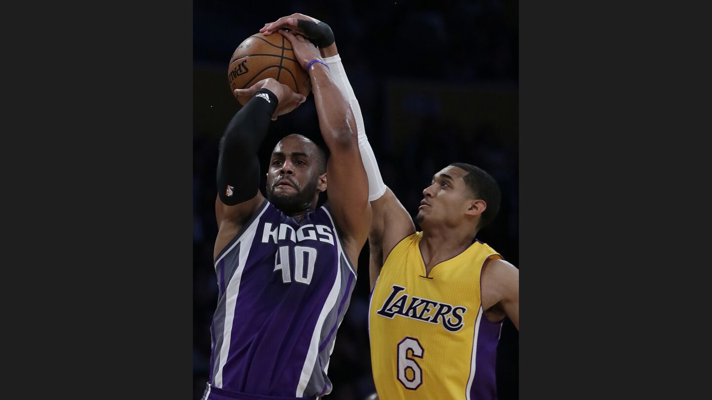 Lakers guard Jordan Clarkson blocks the shot of Kings forward Arron Afflalo during first half action at Staples Center.