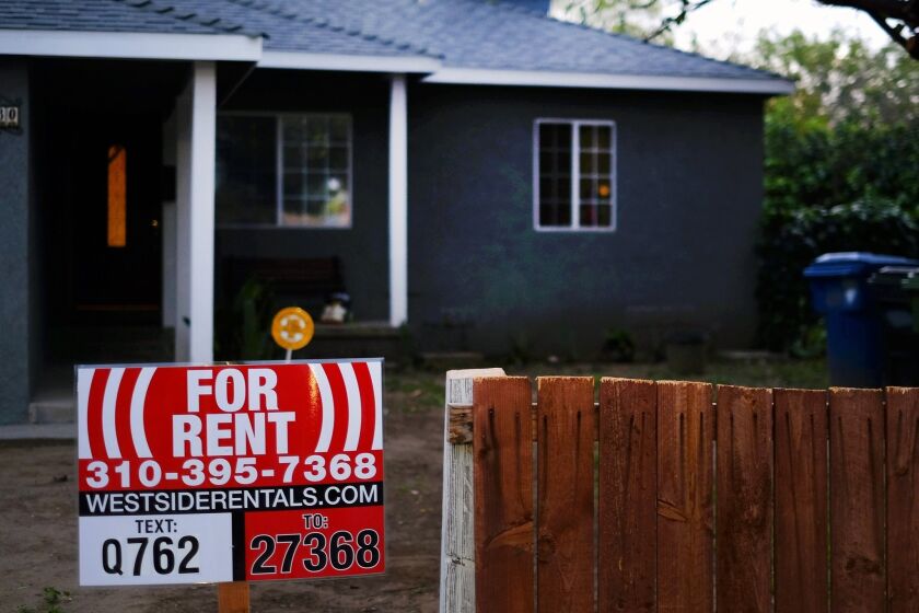FILE - This Friday, Feb. 27, 2015 file photo shows a sign advertising a house for rent in Los Angeles. Real estate data firm Zillow releases its August data on rental prices around the country on Tuesday, Sept. 22, 2015. (AP Photo/Richard Vogel, File)