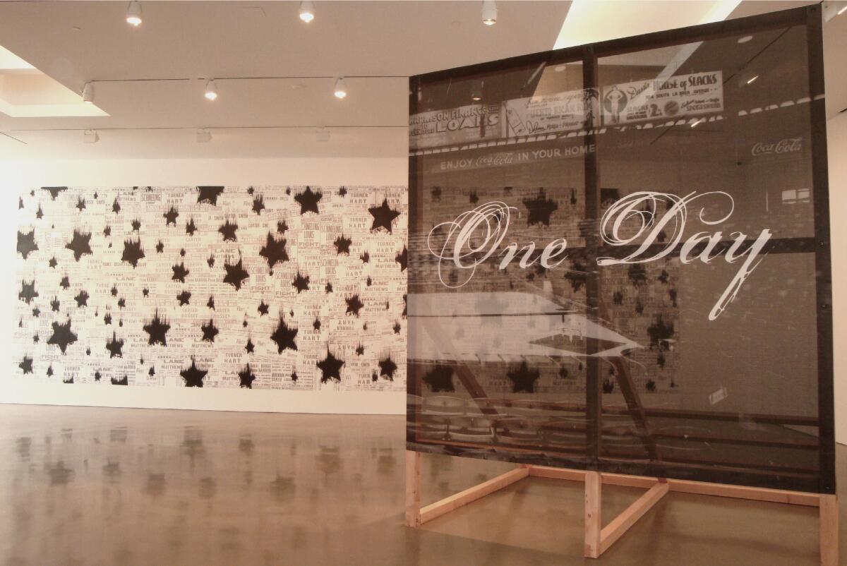 Gary Simmons' mixed media "Black Star Shower" (rear) and "Just for One Day (detail)," both 2013