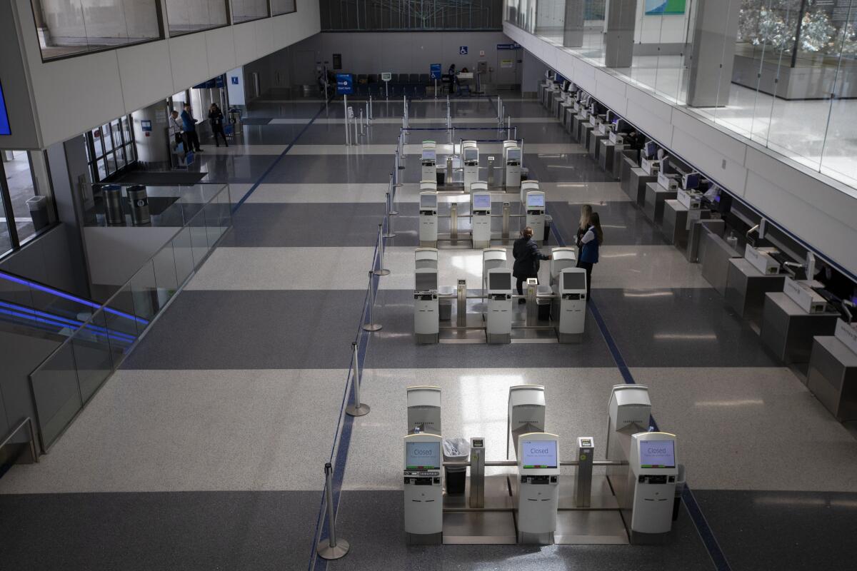 Scene of a nearly empty terminal at LAX