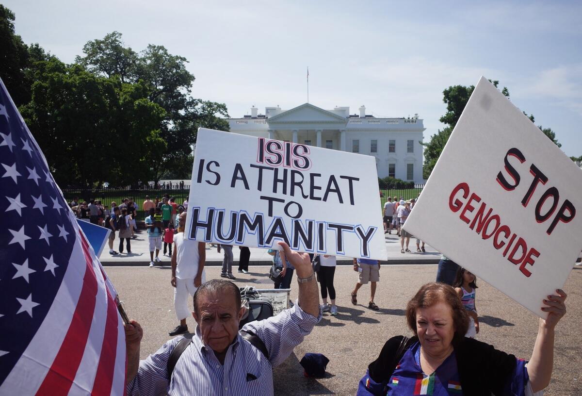 Demonstrators rally against the Islamic State militant group, also known by the acronym ISIS, outside the White House on Aug. 16.