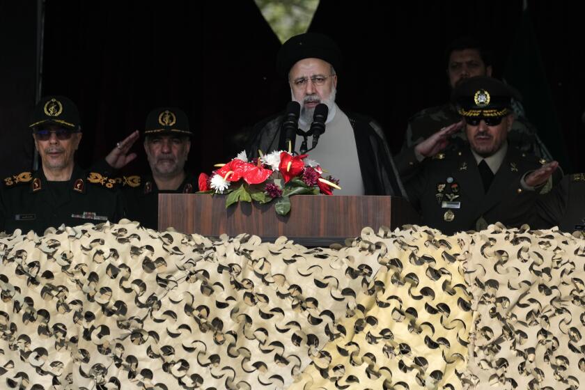 Iranian President Ebrahim Raisi speaks during Army Day parade at a military base in northern Tehran, Iran, Wednesday, April 17, 2024. Raisi warned that the "tiniest invasion" by Israel would bring a "massive and harsh" response, as the region braces for potential Israeli retaliation after Iran's attack over the weekend. (AP Photo/Vahid Salemi)