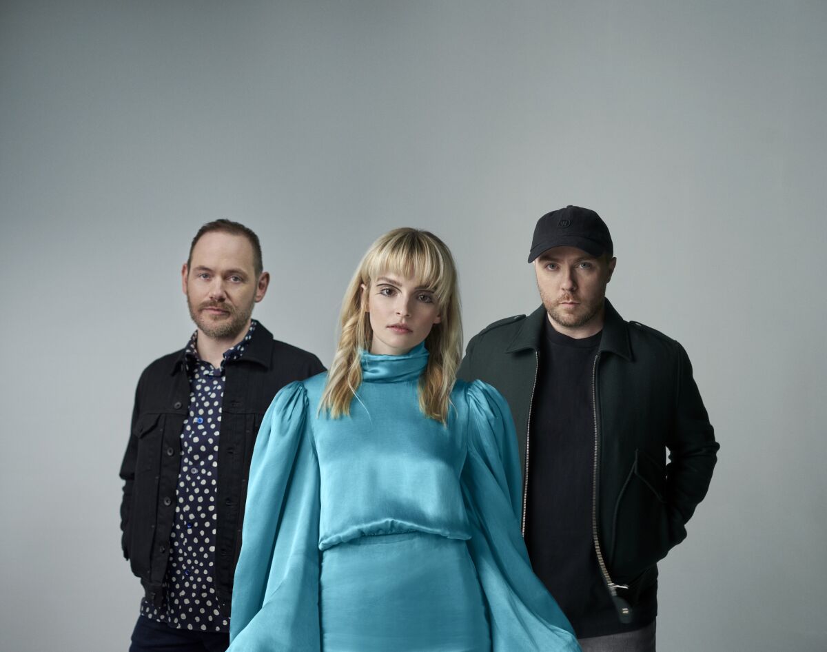 Chvrches members, from left, Iain Cook, Lauren Mayberry and Martin Doherty