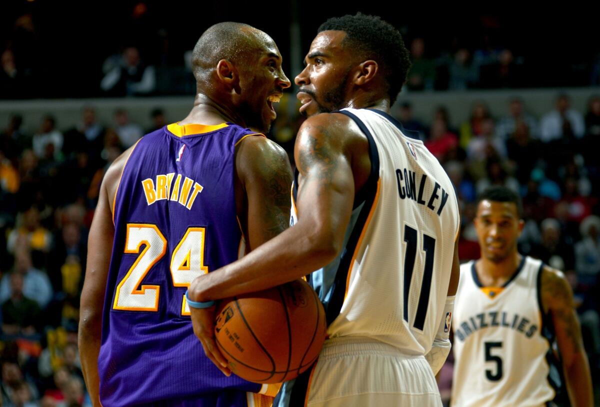 Kobe Bryant reacts after getting called for a foul on Memphis' Mike Conley. Bryant had 28 points with seven rebounds and six assists in the Lakers' 107-102 loss to the Grizzlies.