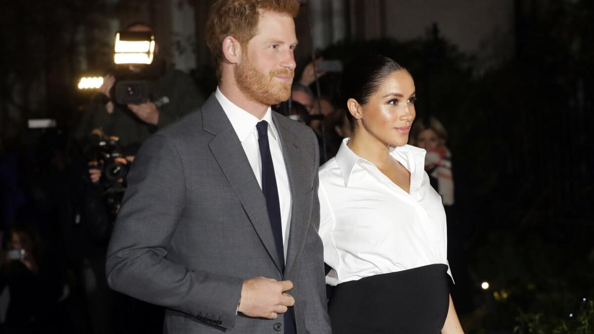 Britain's Prince Harry and Meghan, Duchess of Sussex, arrive at the annual Endeavour Fund Awards in London on Feb. 7.