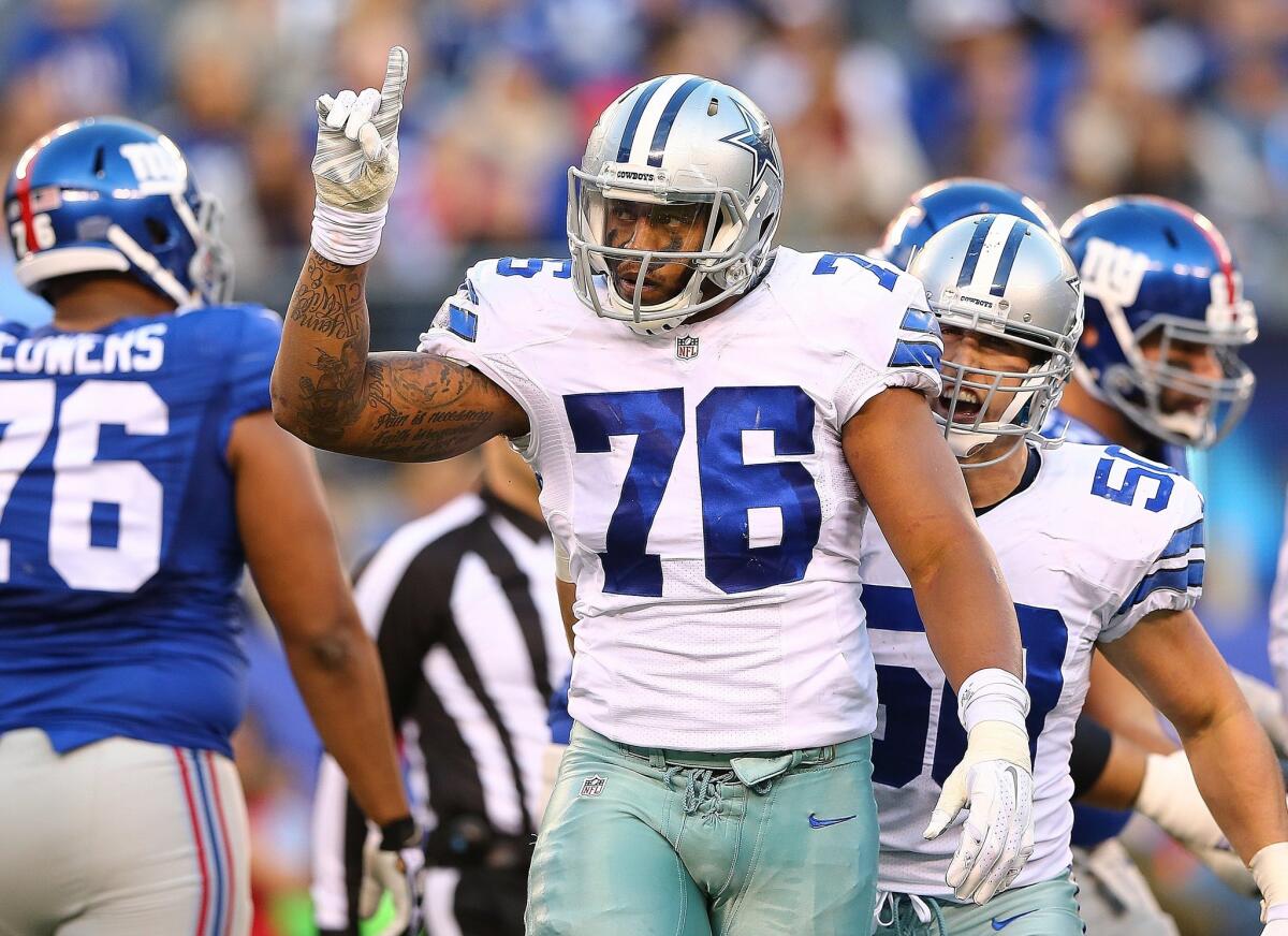 Dallas' Greg Hardy celebrates a sack Sunday against the New York Giants.