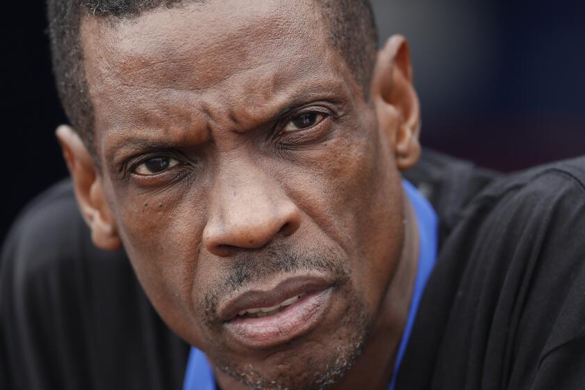FILE - In this Monday, March 13, 2017 file photo, Former New York Mets pitcher Dwight "Doc" Gooden watches batting practice before inning of a spring training baseball game between the Mets and the Miami Marlins in Port St. Lucie, Fla. Former New York Mets pitcher Dwight Gooden has been arrested again in New Jersey. Newark police says Gooden was pulled over late Monday night, July 22, 2019 after driving the wrong way down a one-way road and charged with driving while intoxicated. (AP Photo/John Bazemore, File)