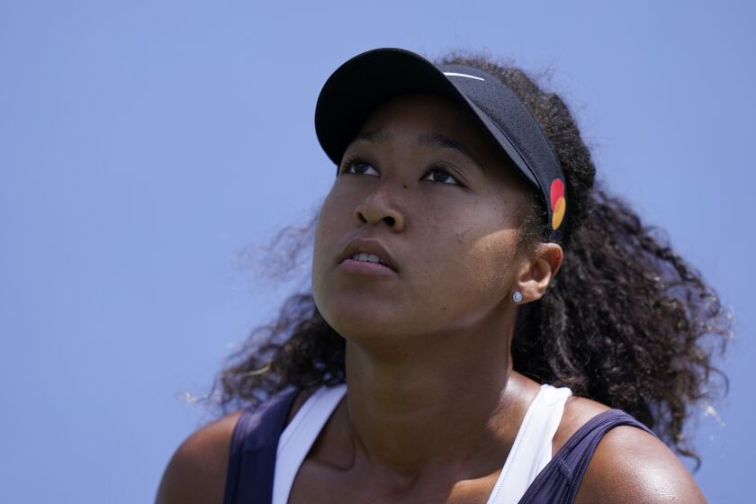 Naomi Osaka, of Japan, looks up during her match with Anett Kontaveit, of Estonia, during the quarterfinals at the Western & Southern Open tennis tournament Wednesday, Aug. 26, 2020, in New York. (AP Photo/Frank Franklin II)