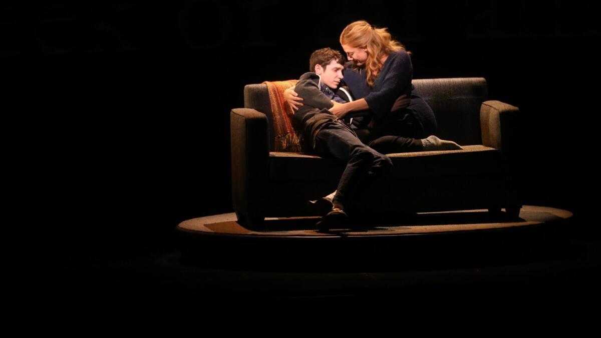 Ben Levi Ross as the title character and Jessica Phillips as his mom in "Dear Evan Hansen" at the Ahmanson Theatre in Los Angeles.
