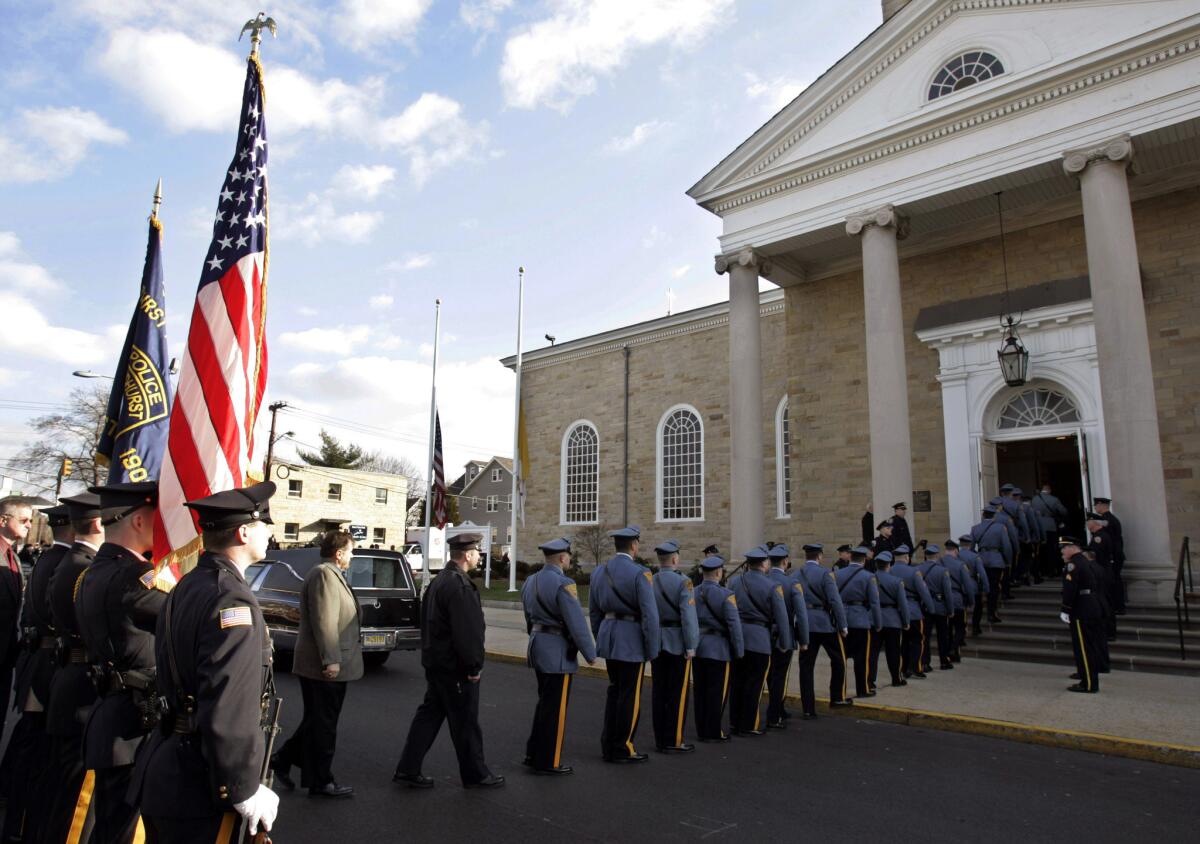 The funeral of New York Police Officer James Zadroga in 2006. The law providing health benefits to first responders was named after Zadroga.
