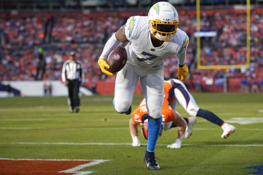 Los Angeles Chargers tight end Gerald Everett (7) scores a touchdown after making a catch against the Denver Broncos 