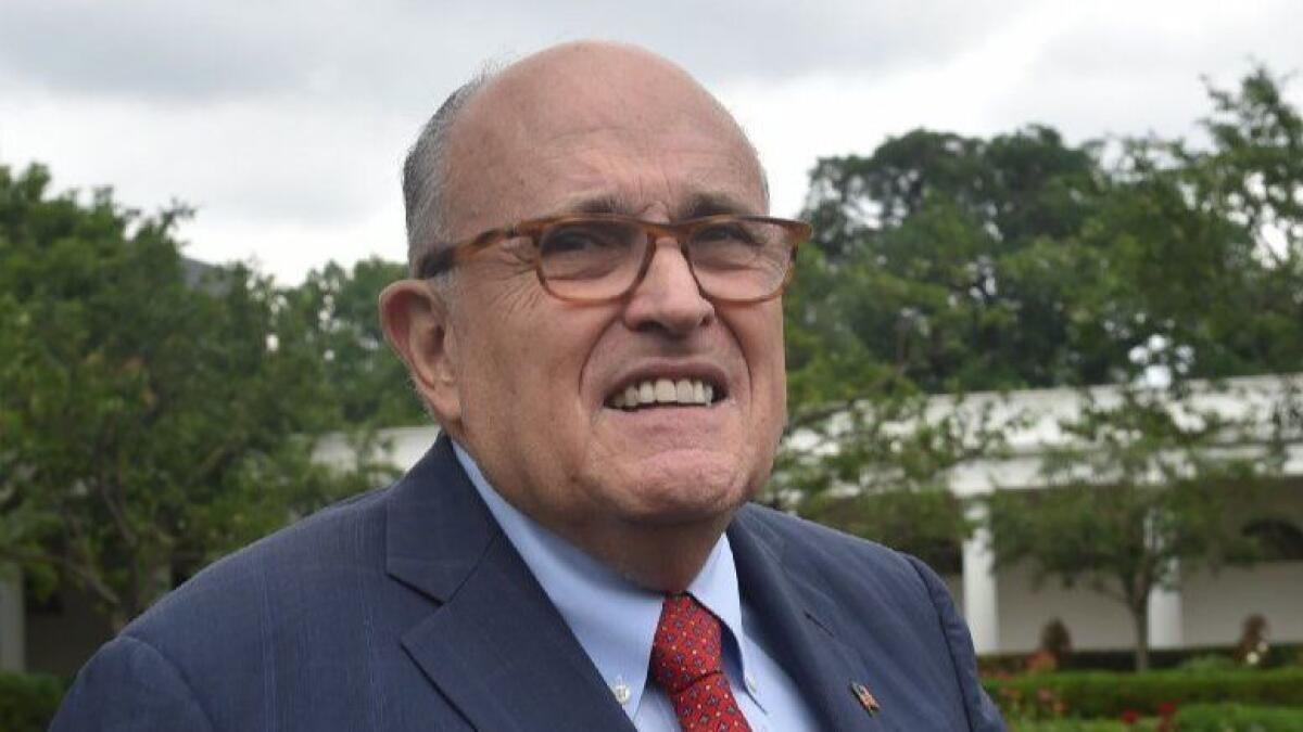 President Trump's lawyer Rudy Giuliani walks outside the White House on Wednesday.