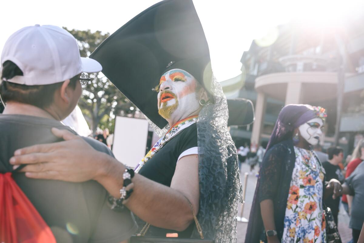 Members of the Sisters of Perpetual Indulgence interact with fans during Pride Night at Angel Stadium in Anaheim on June 7.