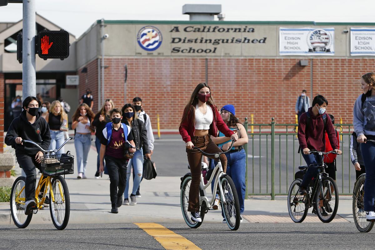 Students leave campus at Edison High School on Thursday afternoon.