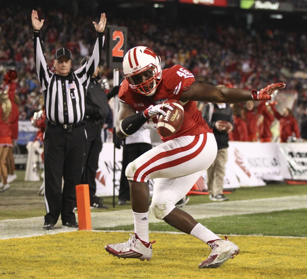 Wisconsin receiver Austin Traylor does a celebratory dance in the end zone after a touchdown reception against USC in the third quarter.