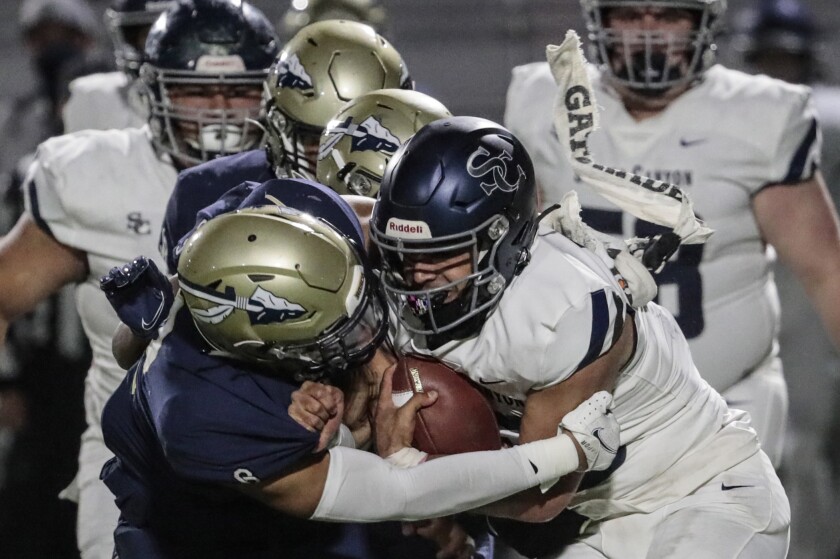 St. John Bosco linebacker Andrew Simpson sacks Sierra Canyon quarterback Daniel Duran during a game