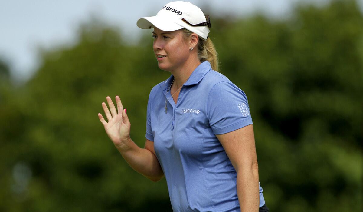 Brittany Lincicome acknowledges the crowd after making birdie on the ninth hole during the second round of the LPGA Championship on Friday at Monroe Golf Club.