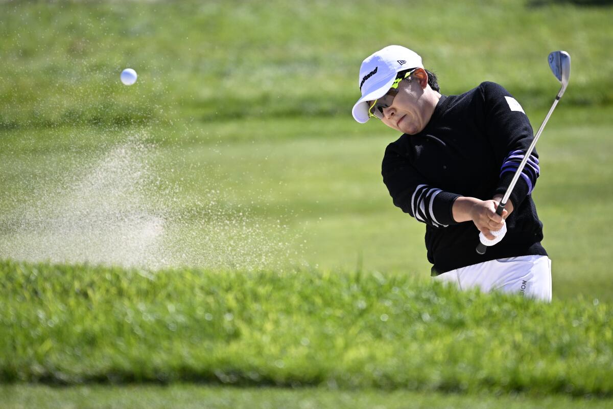 Jiyai Shin hits out of a bunker on the 16th hole at Palos Verdes Golf Club.