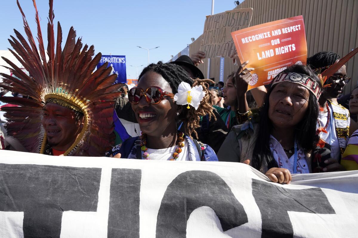 Demonstrators participate in a protest at the COP27 U.N. Climate Summit, Saturday, Nov. 12, 2022, in Sharm el-Sheikh, Egypt. 