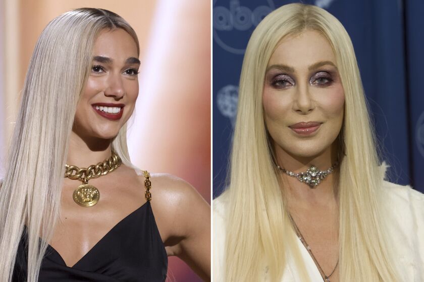 Left, Dua Lipa during the 64th Annual Grammy Awards in Las Vegas in April 2022. Right, Cher backstage at the 52nd Emmy Awards Show in Sept. 2000 in Los Angeles.