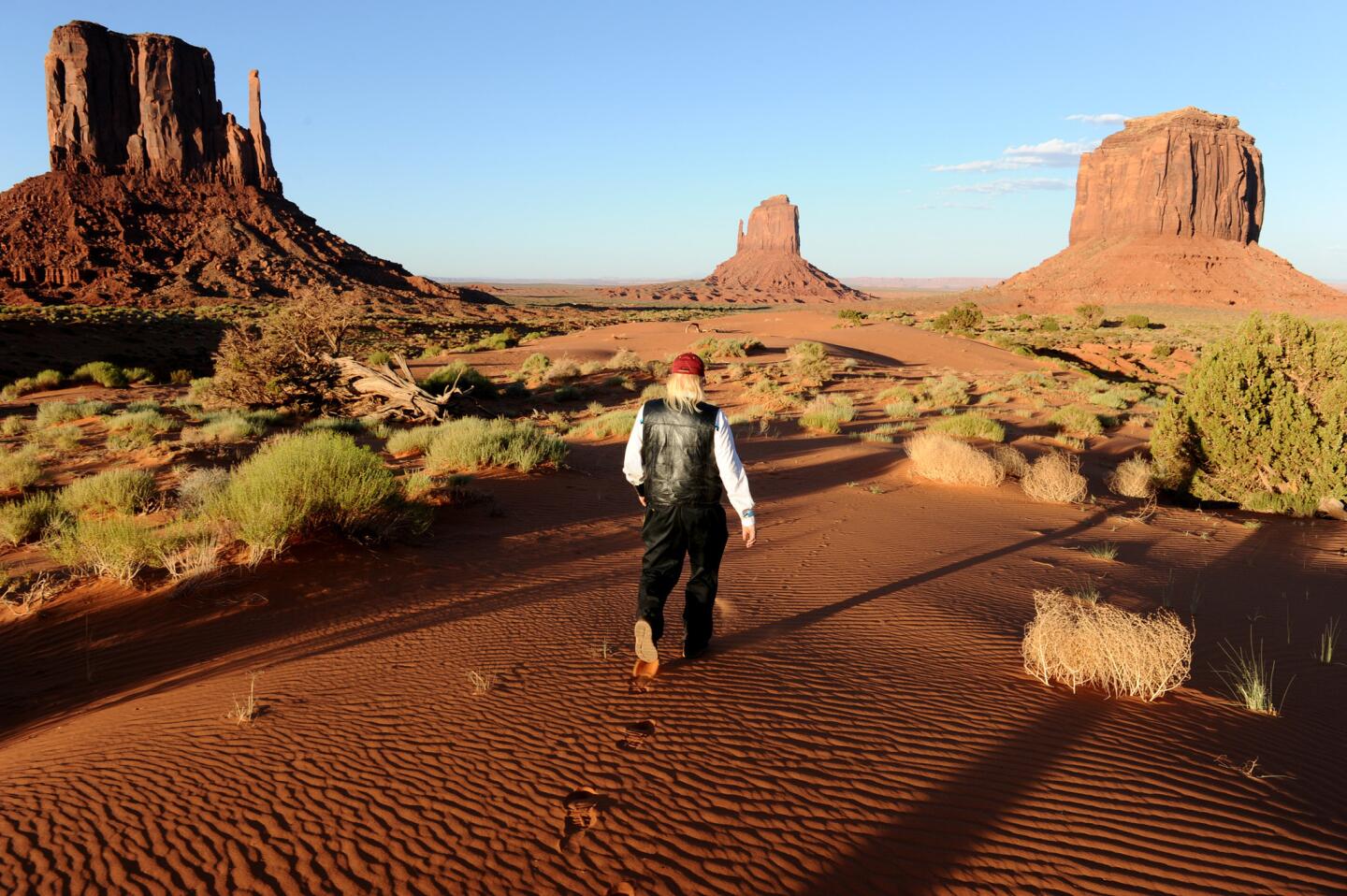 Harold Simpson runs Simpson's Trailhandler Tours, which brings thousands of mostly foreign visitors into the park on guided cultural expeditions. On each, he explains how one relative, whom he calls "Mr. Gray Whiskers," helped designate the tribal park in 1958.