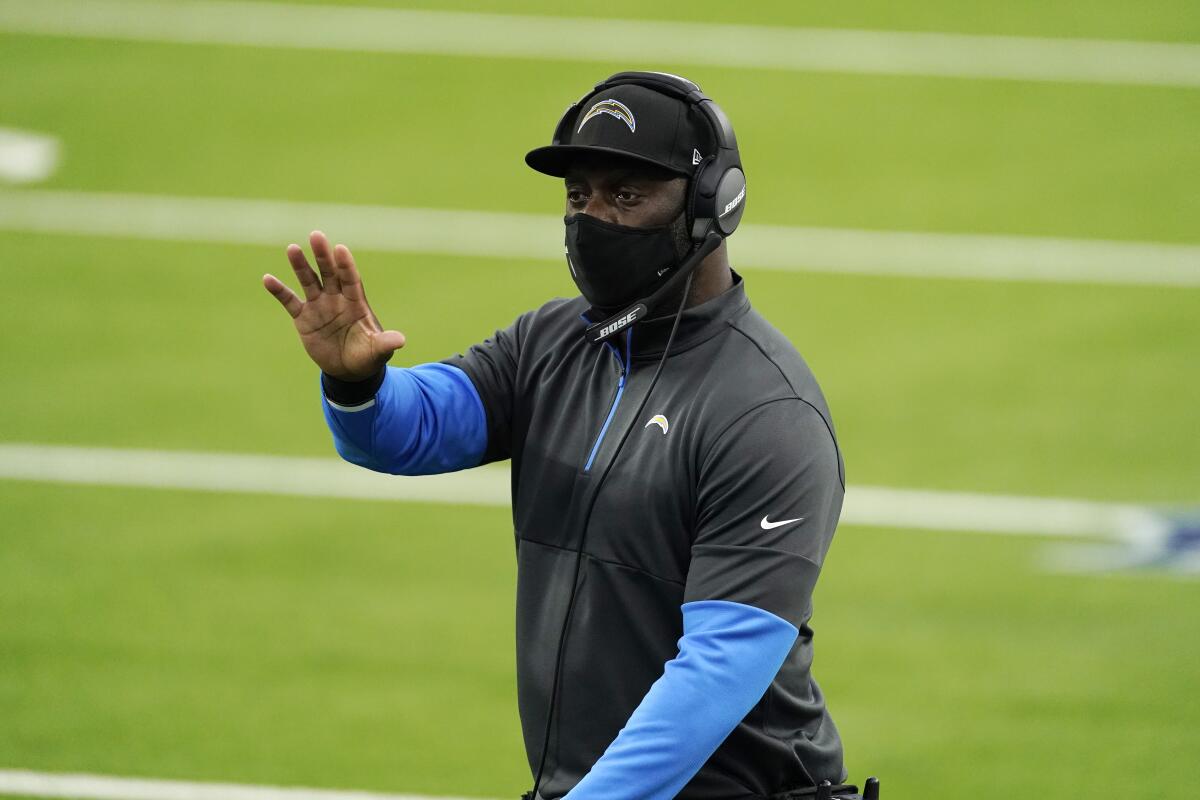 Chargers coach Anthony Lynn signals from the sideline during Sunday's win over the Atlanta Falcons.