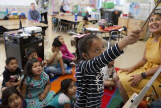 LOS ANGELES, CALIF. - AUGUST 06, 2019: Brenda Sarat, 6, leads her class in sounding out words phonetically at Esperanza Elementary School on Tuesday, Aug. 6, 2019 in Los Angeles, Calif. L.A. Unified is running a new summer program for incoming first graders who are slightly behind academically to ensure they catch up and don't need more interventions and credit recovery when they're older. (Liz Moughon / Los Angeles Times)