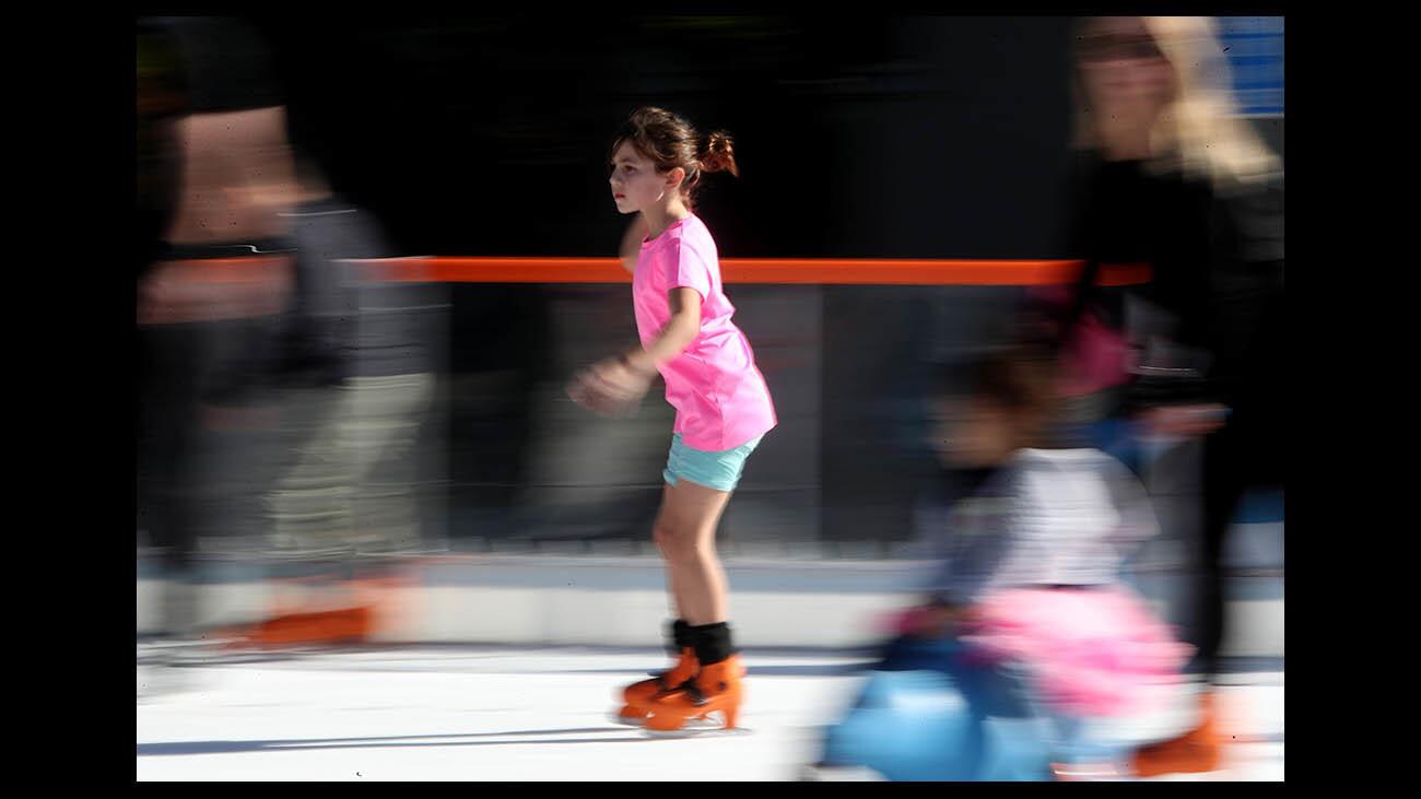 Photo Gallery: Annual Ice America ice skating rink opens to public in Burbank