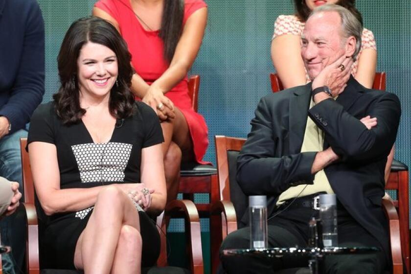 Lauren Graham, with "Parenthood" co-star Craig T. Nelson, takes part in a panel discussion in Beverly Hills during the 2013 Summer Television Critics Assn. tour.