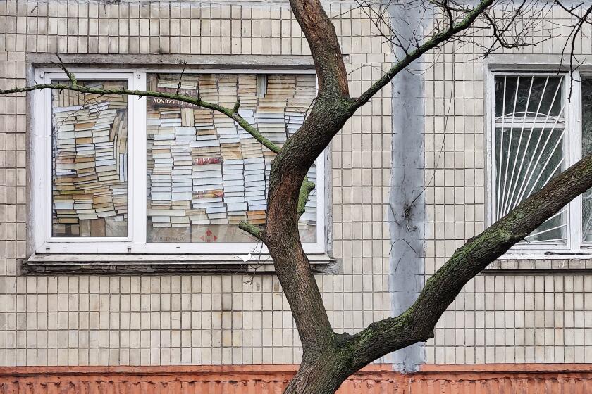 A window is barricaded with books in the Voskresenka district of Kyiv, Ukraine, as the Russian army advances, March 3.