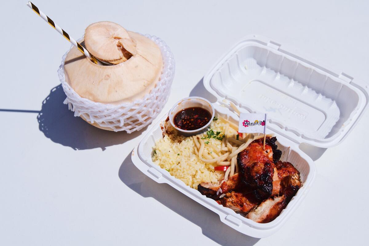 Chicken inasal with garlic rice and fresh coconut water