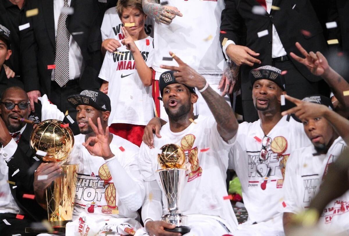 Miami Heat players Dwyane Wade, LeBron James and Chris Bosh led the team to victory over the San Antonio Spurs 95-88 in Game 7 the NBA Finals. The game drew high ratings on ABC.