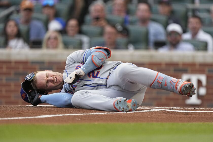 New York Mets first baseman Pete Alonso reacts after being hit by a pitch from Atlanta Braves starting pitcher Charlie Morton in the first inning of a baseball game, Wednesday, June 7, 2023, in Atlanta. Alonzo left the game and went into the clubhouse for treatment. (AP Photo/John Bazemore)