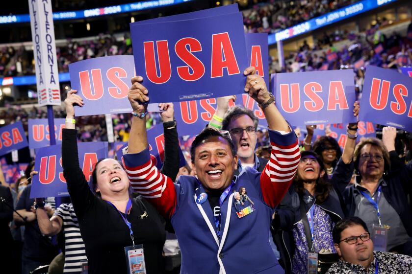 California delegate Robert Camacho, center, during the 2024 Democratic National Convention on Monday.