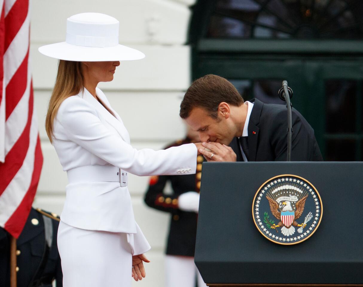 Emmanuel Macron and Melania Trump