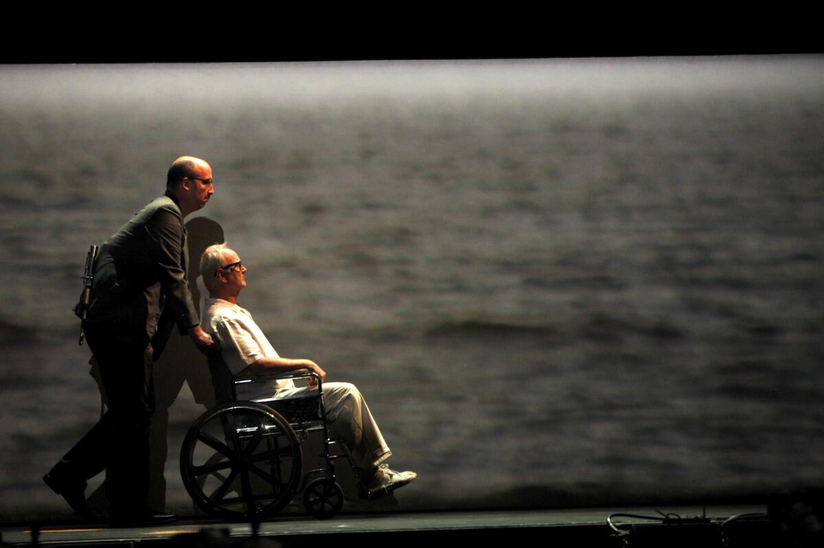 Jason Switzer as Mamoud, left, and Robin Buck as Leon Klinghoffer in John Adams' opera "The Death of Klinghoffer" by Long Beach Opera in March 2014.