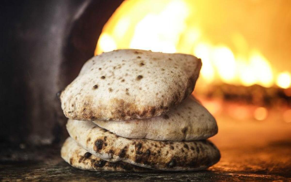 Fire-roasted pita bread.