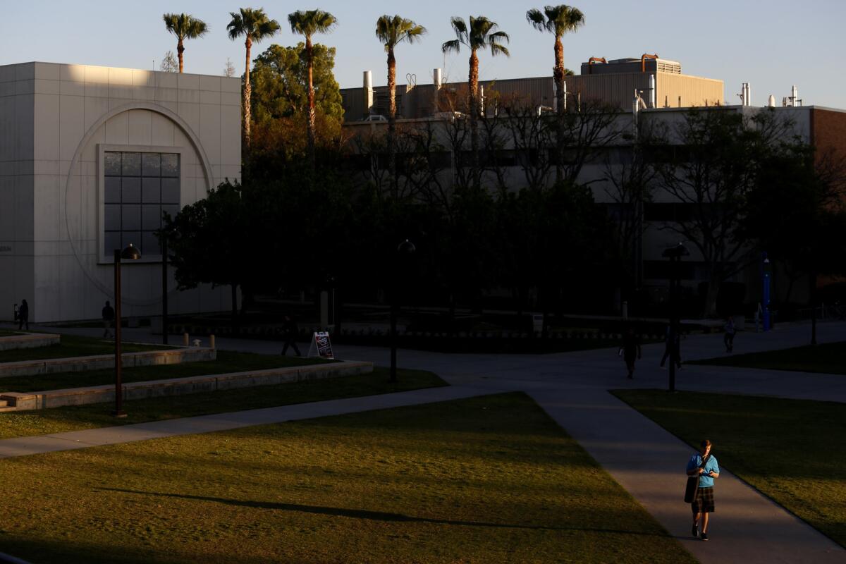 Thirteen Cal State Northridge students are self-isolating amid concerns they may have been exposed to the coronavirus, officials say. 