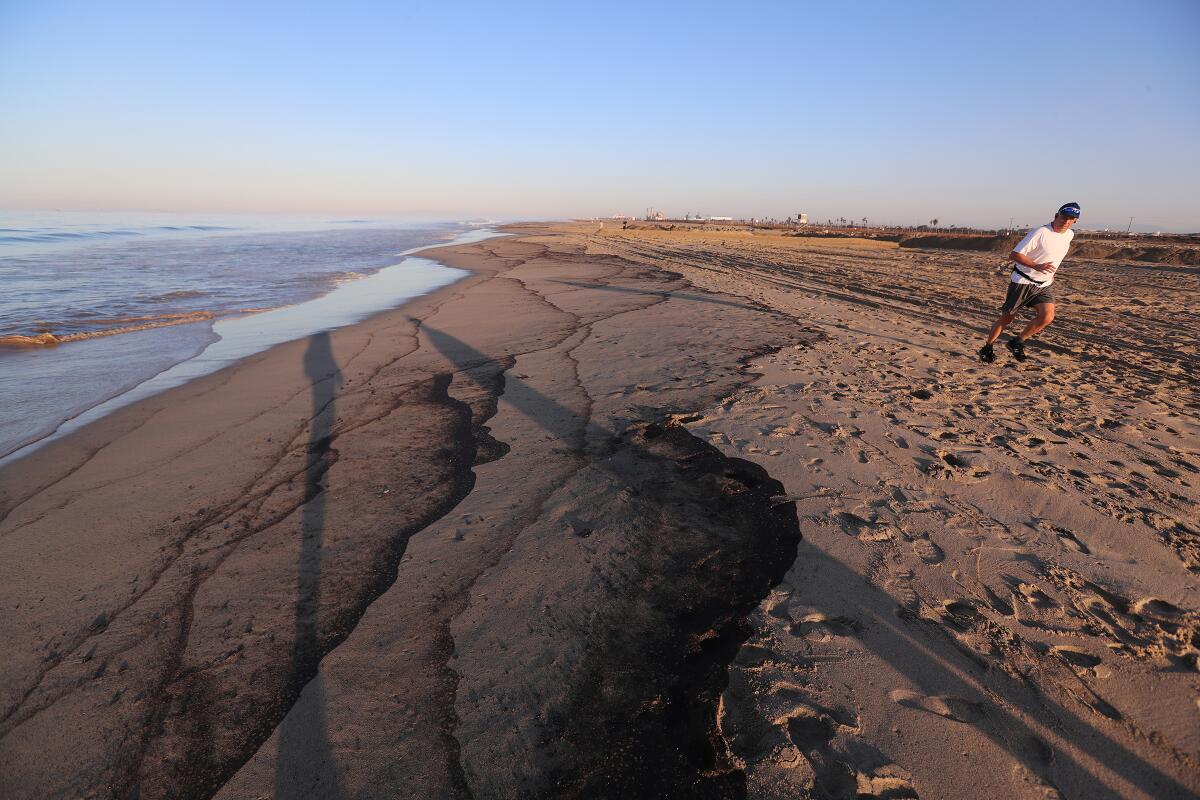 A person jogging along a coastline